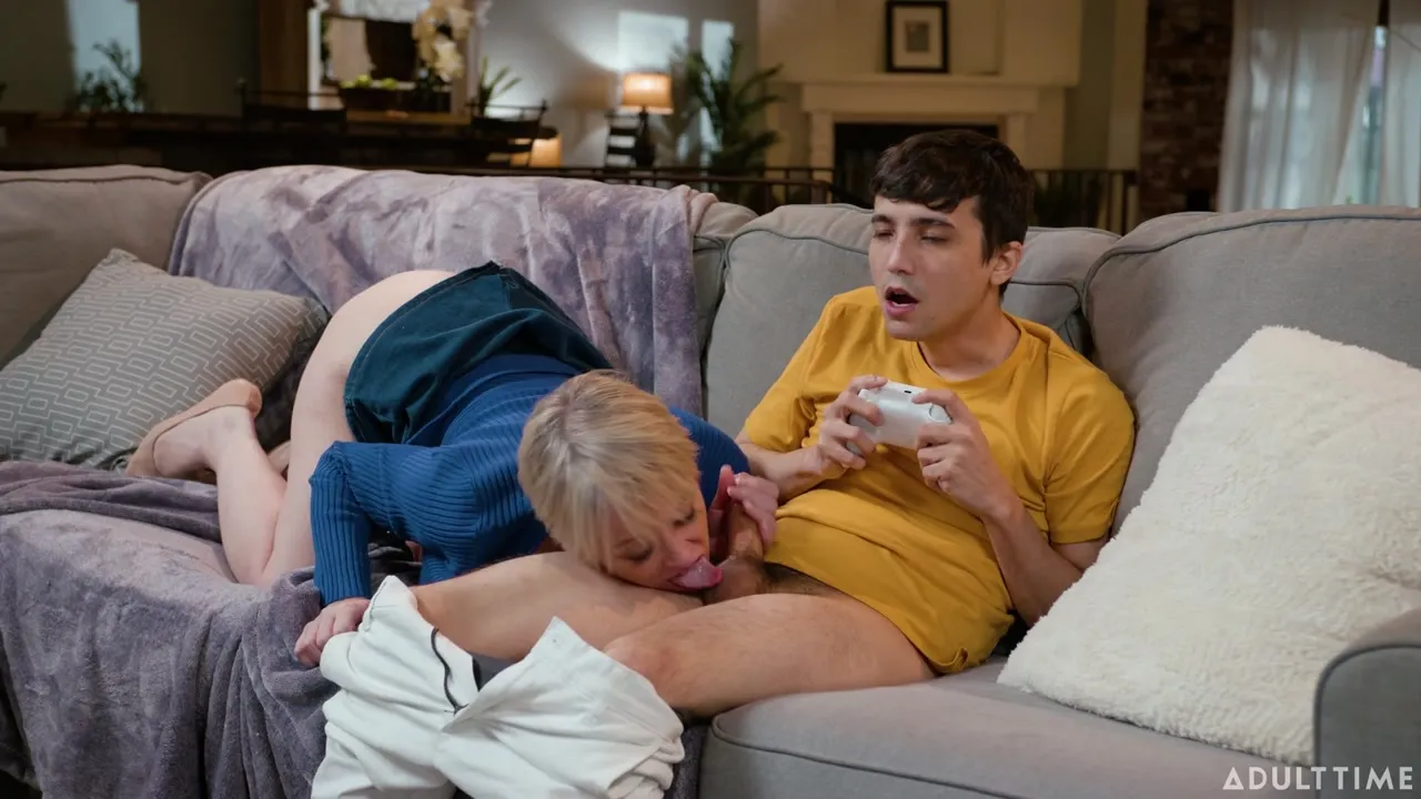 Busty Stepmom Dee Williams Catches Stepson Gaming, Rubs Controller on Pussy Then Fucks Him Raw